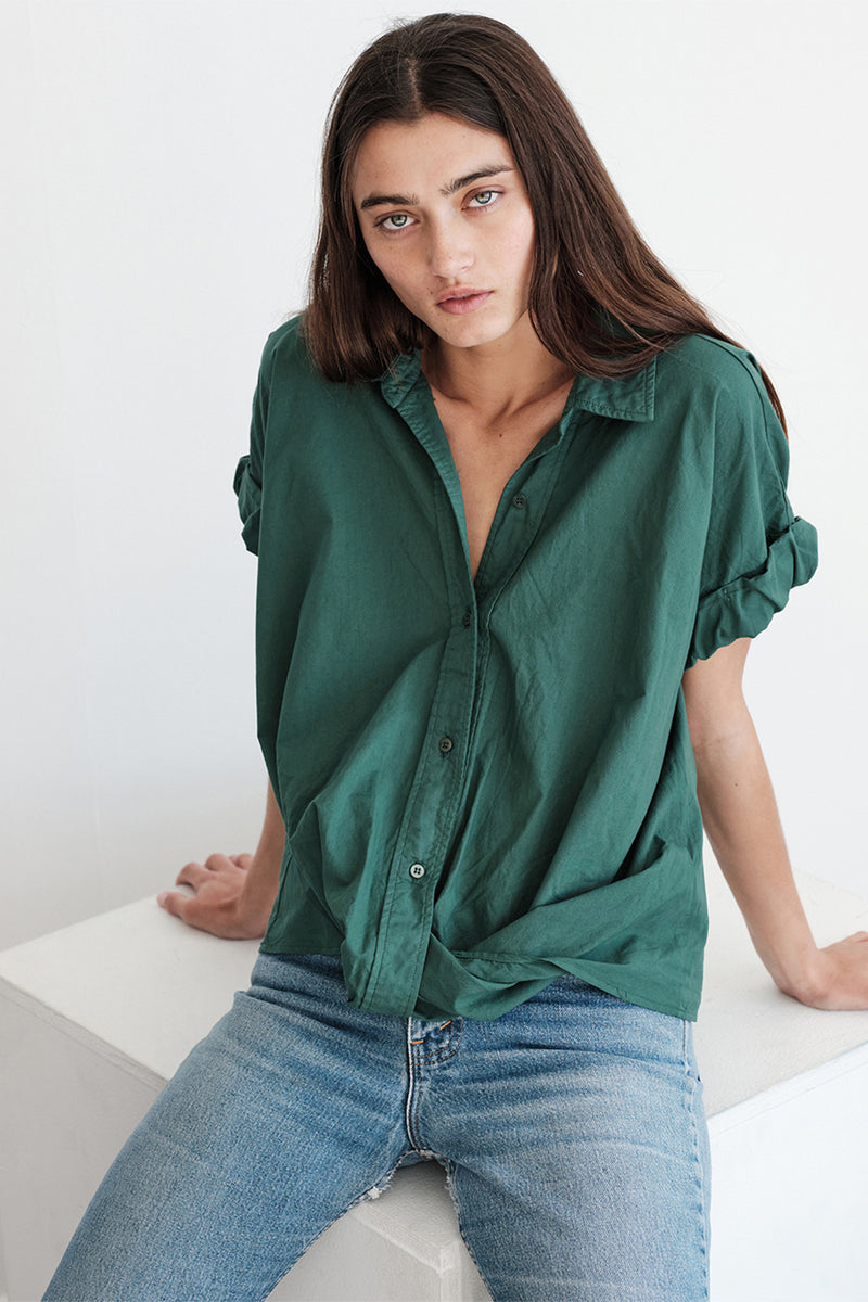 Poplin Short Sleeve Front Twist Shirt in Rainforest-model sitting down