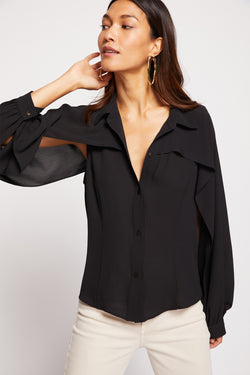 Siff Blouse in Black-model with hand behind her head (3/4 front view)