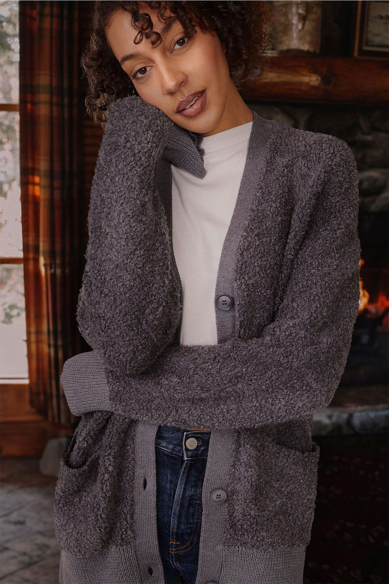 Rabassa Cardigan in Charcoal-fireplace in back