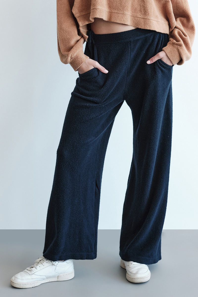 Sherpa Wide Leg Trouser in New Navy-close up (hand in pocket)