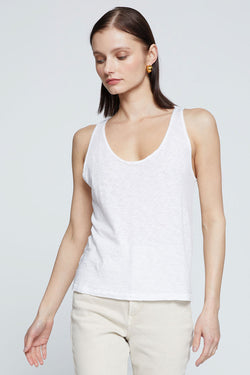 tank top color is white model is looking down 