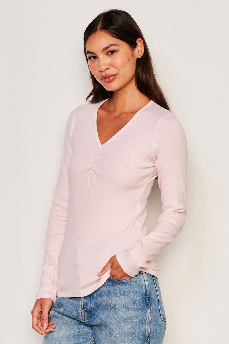 Sundry Long Sleeve V-neck Top in Flush Pink-side view model has her hands in her pocket