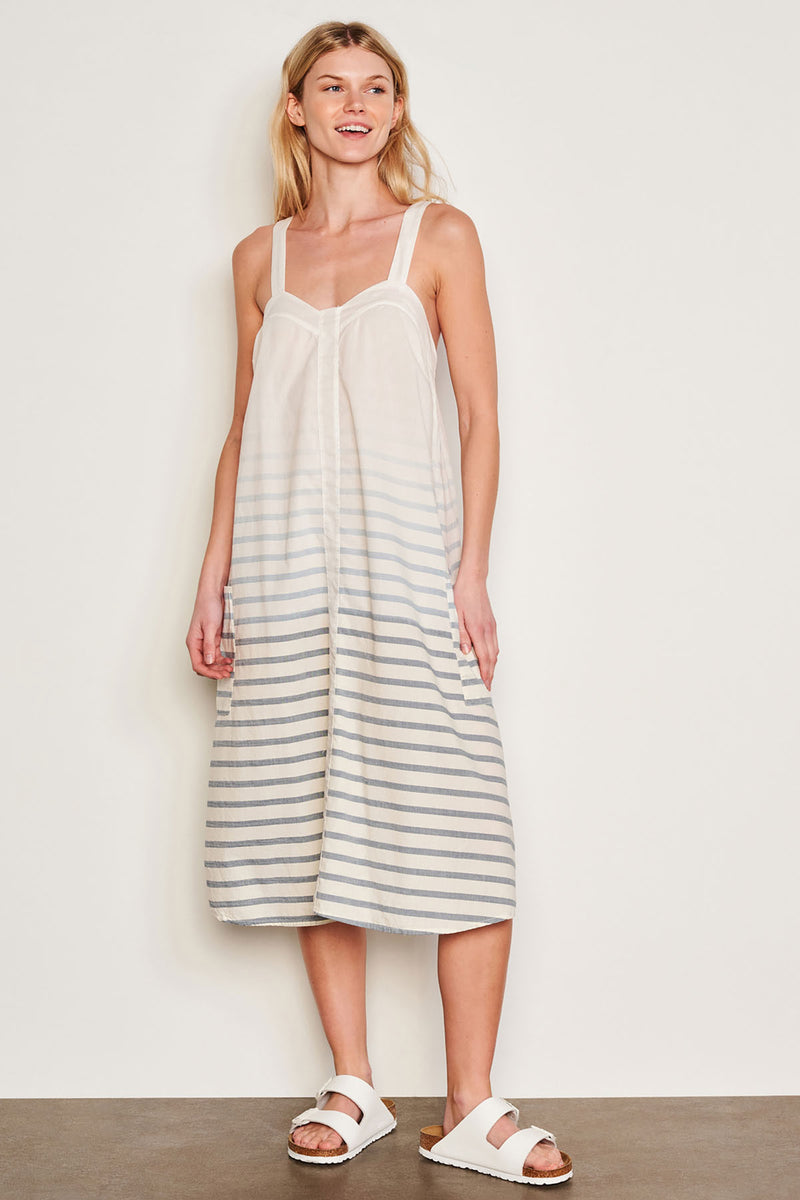 Sundry Changing Tide Stripe Midi Apron Dress in Deep Navy-model is looking away 