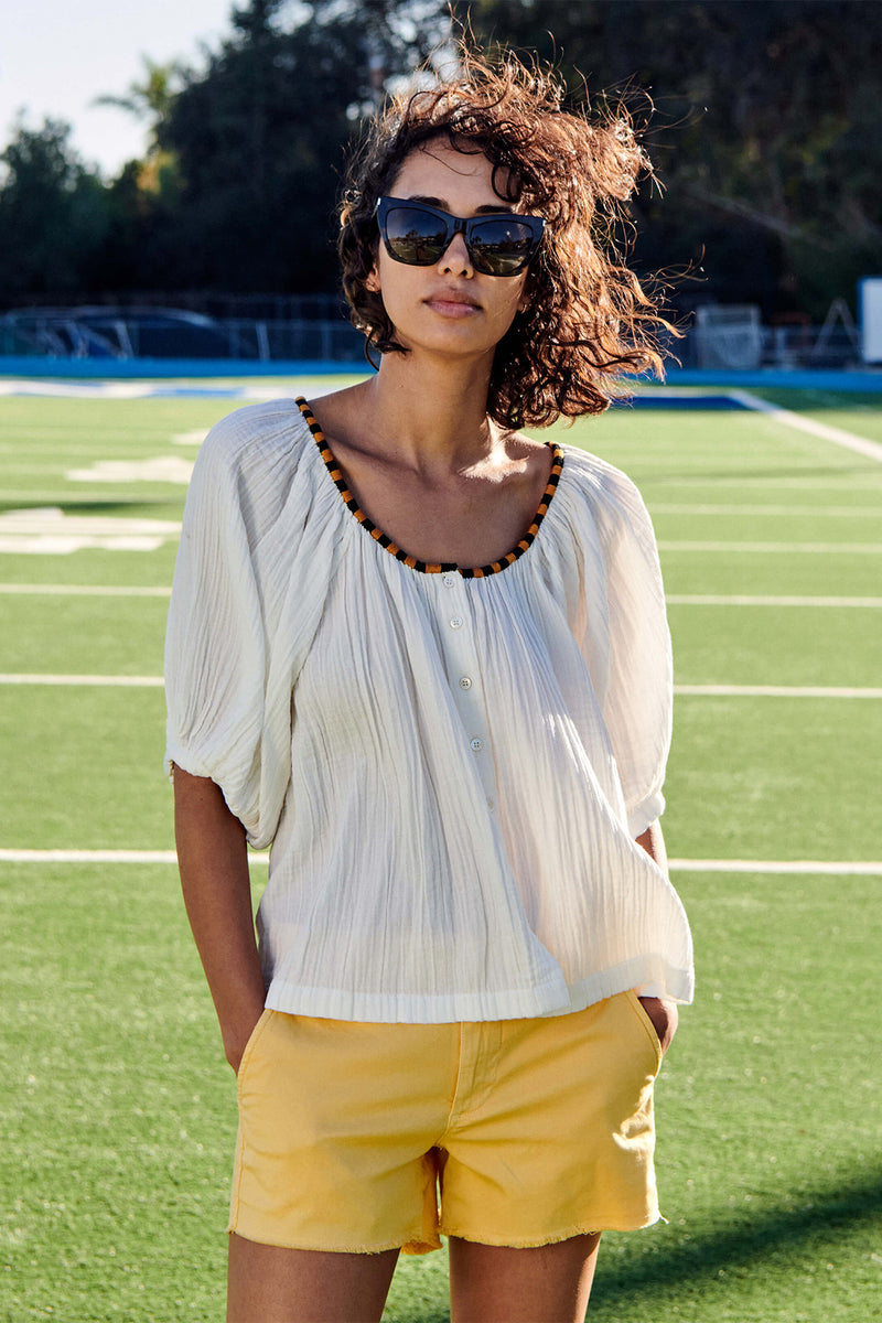 Sundry Puff Sleeve Embroidered Blouse in White-football field background 