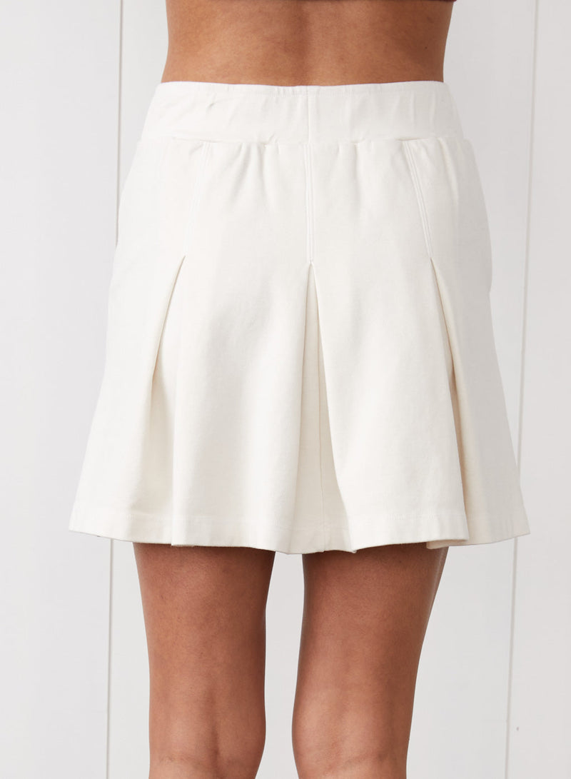 Ponte Pleated Mini Skirt in Cream - back view