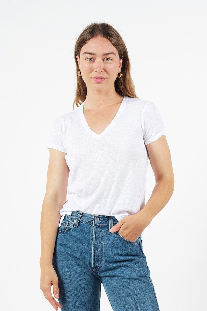 white supima s/s v-neck tee - front paired with jeans